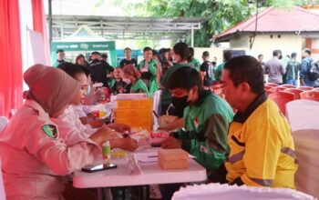 Pengemudi Ojol Senang, Dapat Pelayanan Kesehatan Gratis Hari Bhayangkara ke-79 Polda Sulut